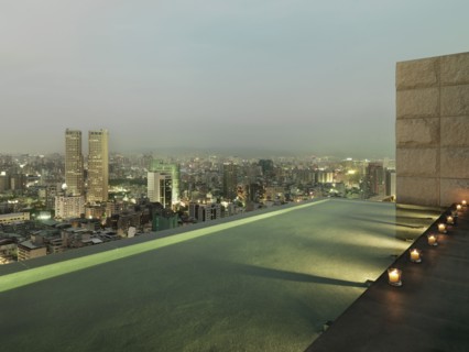 Patio and reflection pool overlooking city