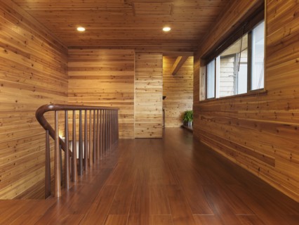 Hardwood hallway in cabin style home