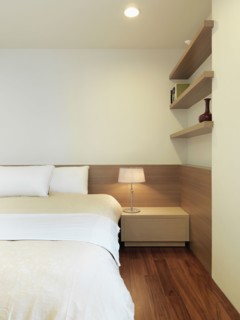 Simple modern bedroom with hardwood floor