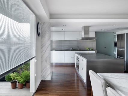 Modern Kitchen and dining room with stainless steel kitchen island