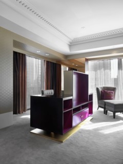 Empty black and pink entertainment center in modern home