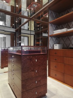 Jewelry case island in high end fashion closet