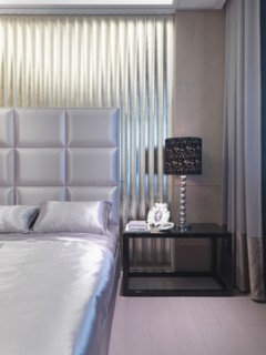 Satin bed with elegant headboard