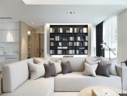 Sectional sofa with throw pillows in modern living room