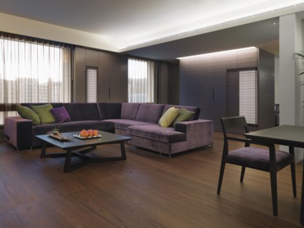 Purple sectional sofa in modern living room