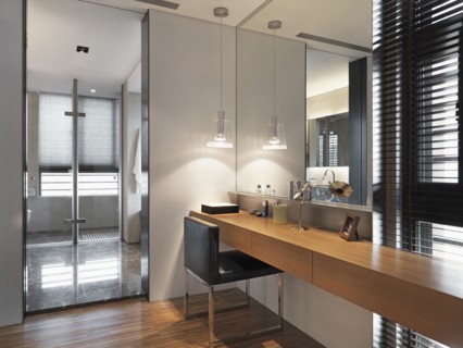 Long wooden vanity in modern home