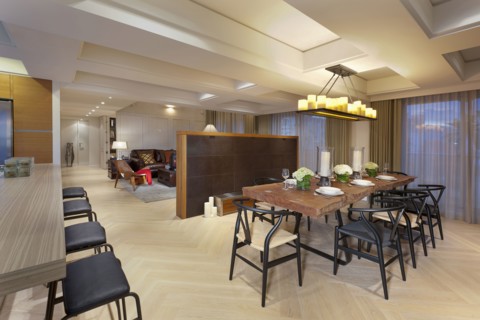 Large wooden dining table in modern home
