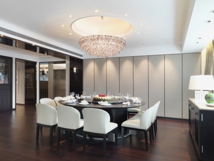 Modern circular dining table with place settings