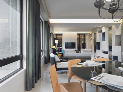 Place settings on circular dining table in modern home