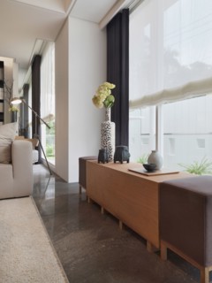Bench and sideboard along window