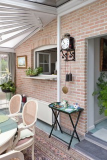 Brick wall in traditional dining room