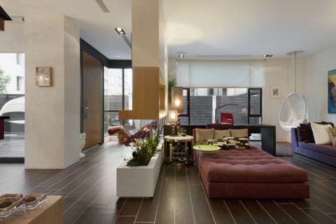 Large and spacious living room with windows at a contemporary home