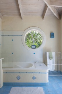 Bathtub and towel rack in bathroom