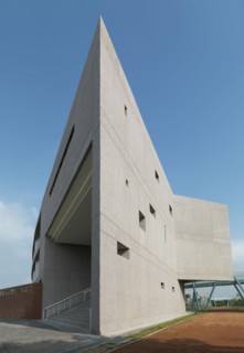 Exterior shot of a commercial building against clear blue sky