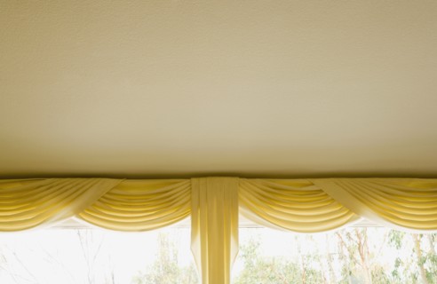 Yellow Valance and Curtains on Window
