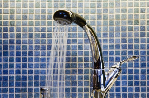 Kitchen Faucet and Blue Tiled Backsplash