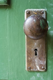 Old Doorknob on Green Door