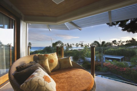 Large Round Orange Chair on Balcony