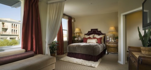Elegant Master Bedroom with Red Accents