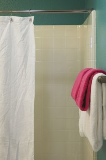Contemporary Teal Bathroom with White Shower and Shower Curtain