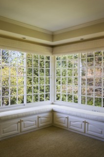 Corner window with benches and cabinets