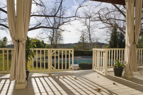 Traditional Back Porch Overlooking Pool