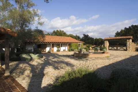 Exterior of Spanish Style Home and Landscape