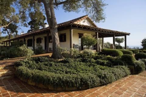 Exterior of Spanish Style Home and Landscape