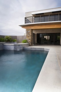Rear Exterior of Modern Home and Swimming Pool