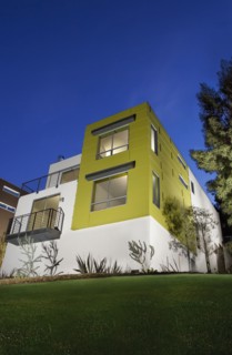 Front Exterior of Modern Condominium at Dusk