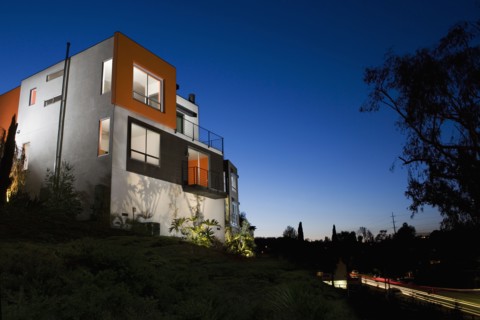 Front Exterior of Modern Condominium at Dusk