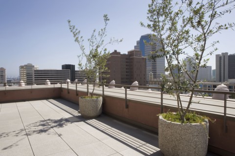 Outdoor patio with view of city.