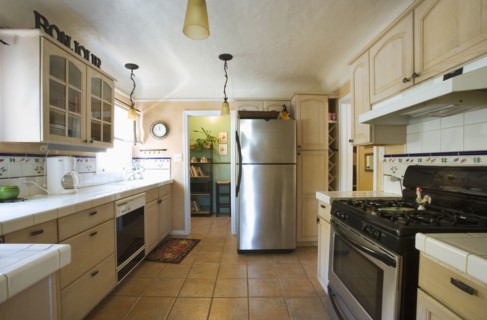 Wide angle image of kitchen.