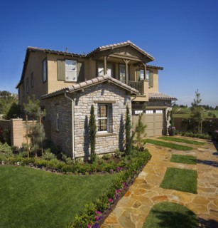 Exterior of a Tuscan Style house during the afternoon