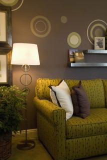End of retro sofa near floor lamp