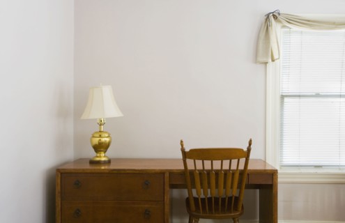 Small desk next to a window