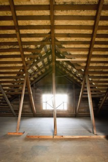 Small window in an unfinished attic