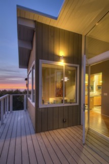 Balcony with floorboards in contemporary house