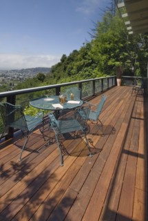 Wooden deck with table and chairs and a view
