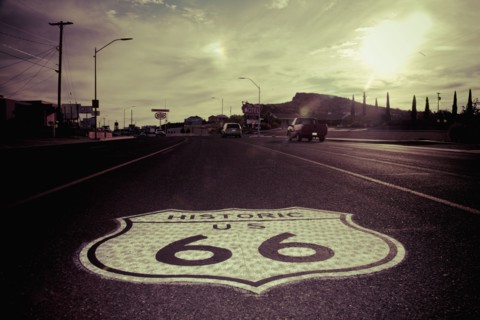 Historic Route 66 sign in pavement on road