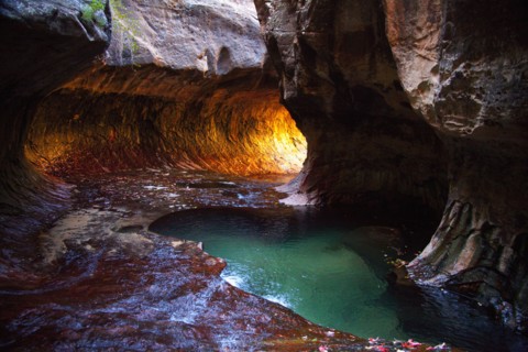Rock formations and pool in cave