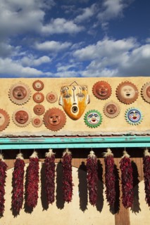 Ornamental masks and hanging dried peppers