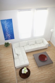 High angle view of sofas and coffee table in modern living room