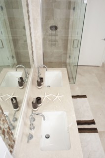 High angle view of sinks and shower in modern bathroom