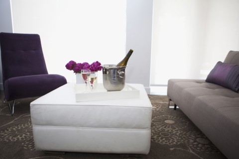 Champagne on coffee table in modern living room