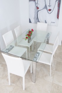 High angle view of table and chairs in modern dining room