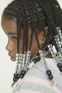 Close up of African girl with braids