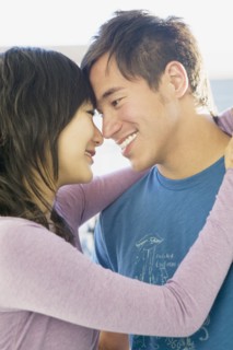 Asian couple hugging