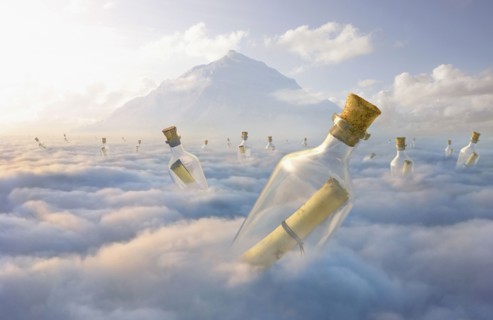 Messages in bottles floating in clouds