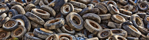 Pile of tires in junkyard